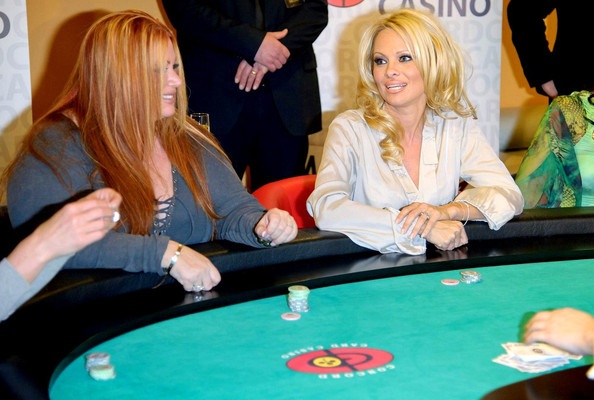 Celebrity Gamblers: Famous Stars Who Love Gambling 6 Pamela Anderson gambling